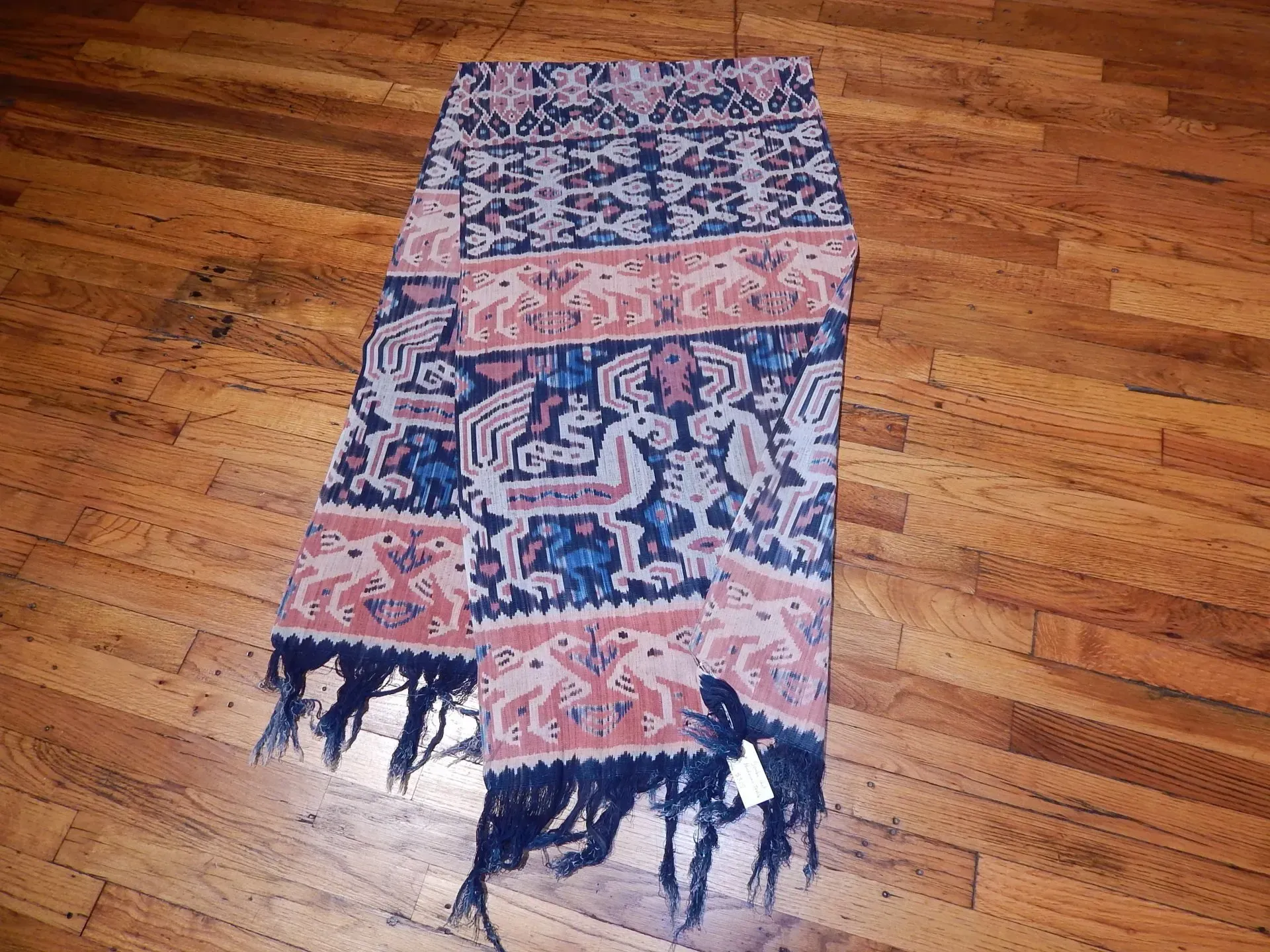 A rug with a detailed pattern on it.