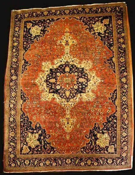 A rug with a detailed pattern on it.