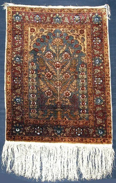 A rug with a detailed pattern on it.