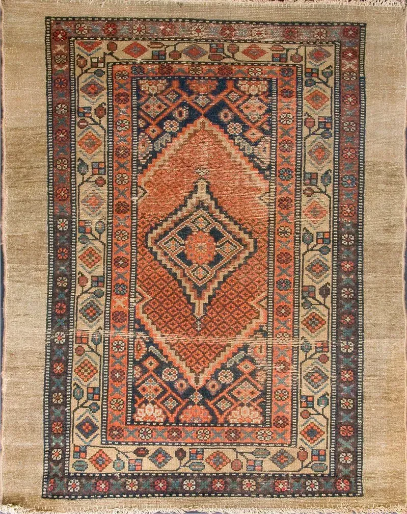 A rug with a detailed pattern on it.