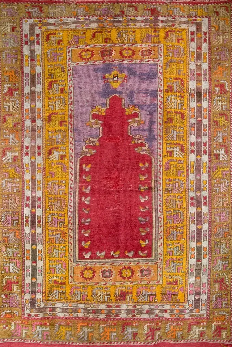 A rug with a detailed pattern on it.