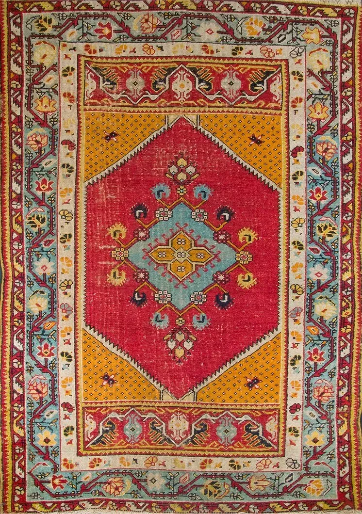 A rug with a detailed pattern on it.