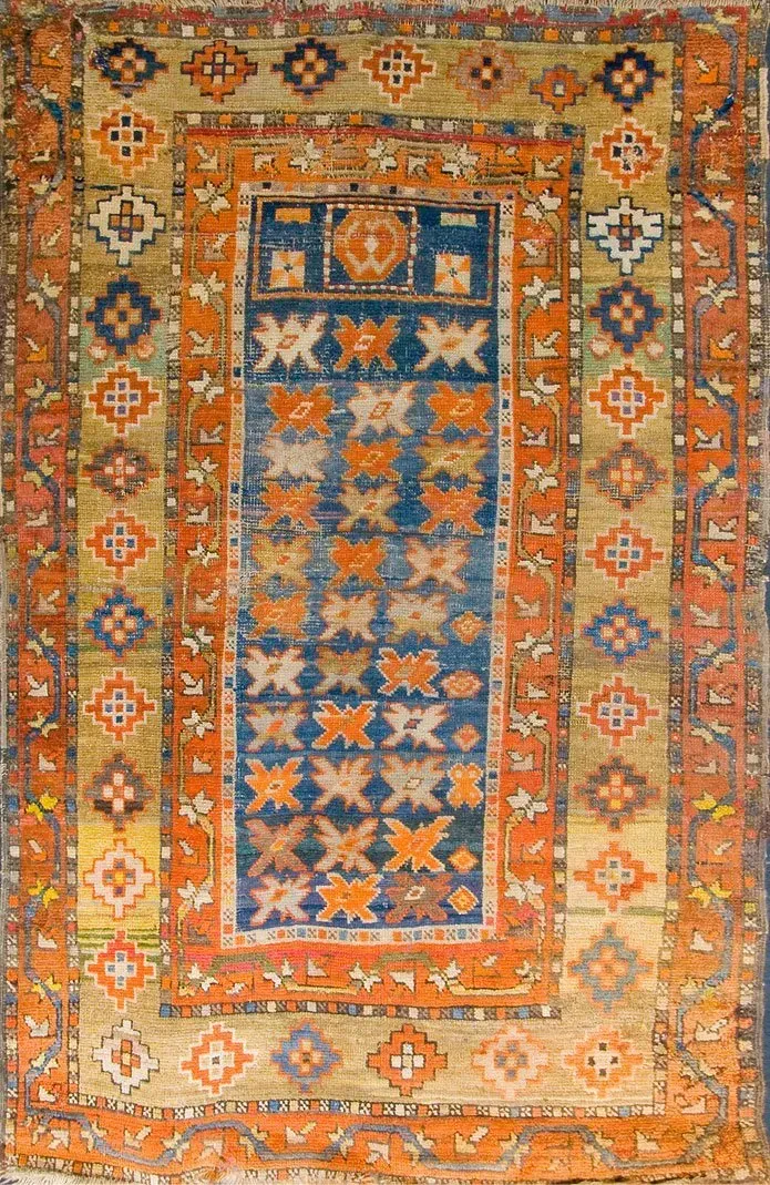 A rug with a detailed pattern on it.