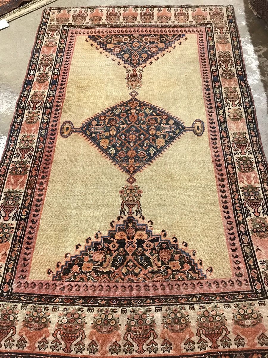 A rug with a detailed pattern on it.