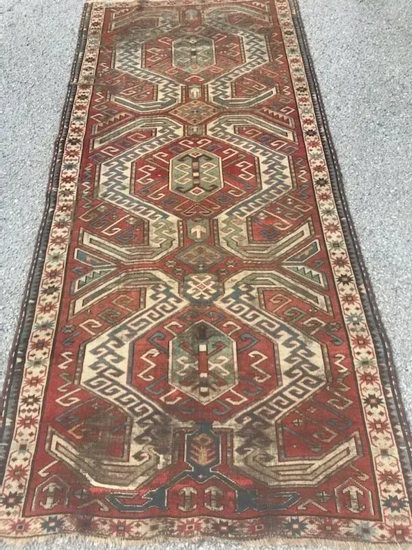 A rug with a detailed pattern on it.