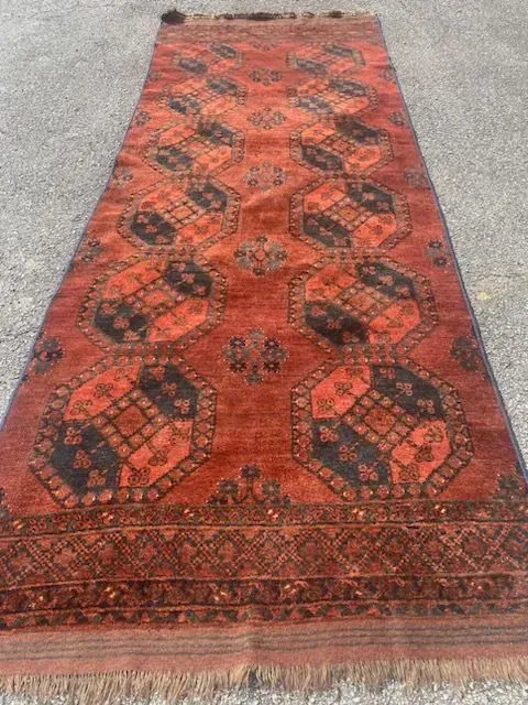 A rug with a detailed pattern on it.