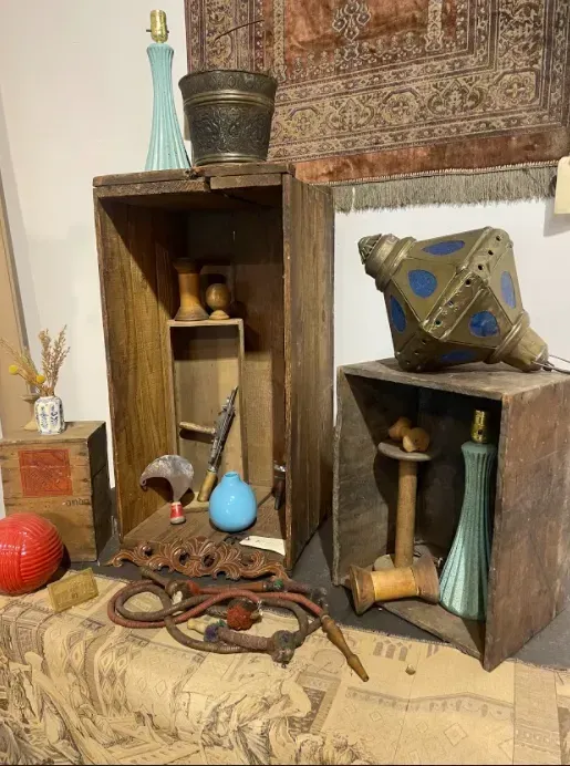 A room filled with lots of boxes and objects.