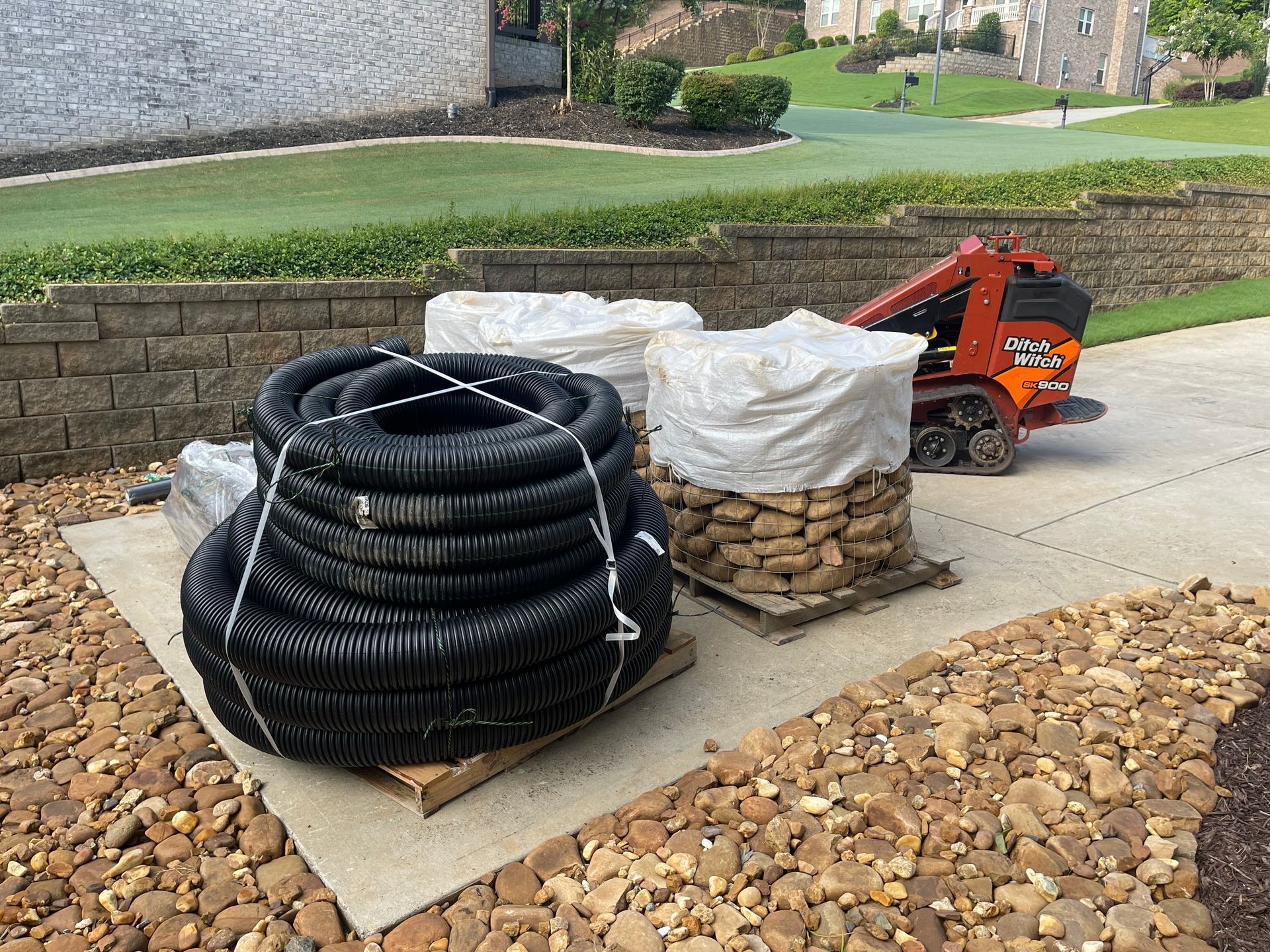 A bunch of hose stacked on top of each other on a pallet