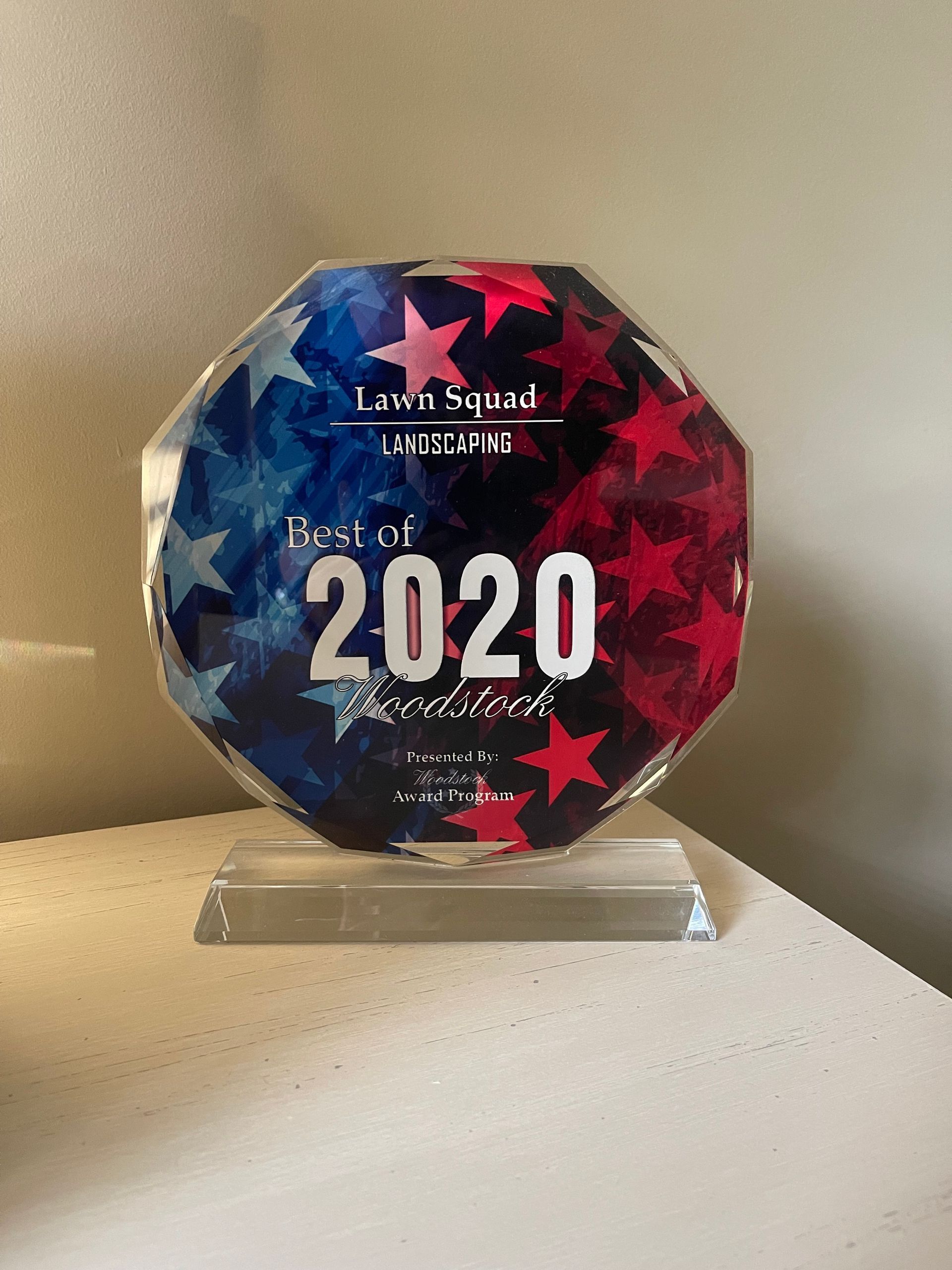 A plaque that says best of 2020 is sitting on a table.