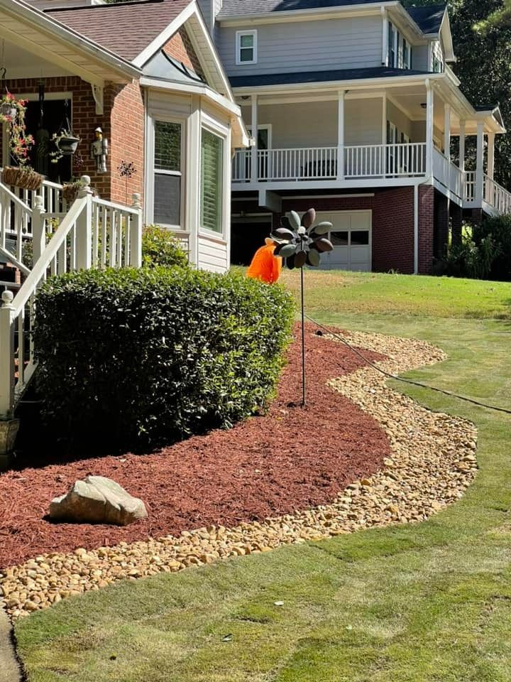 A house with a windmill in front of it
