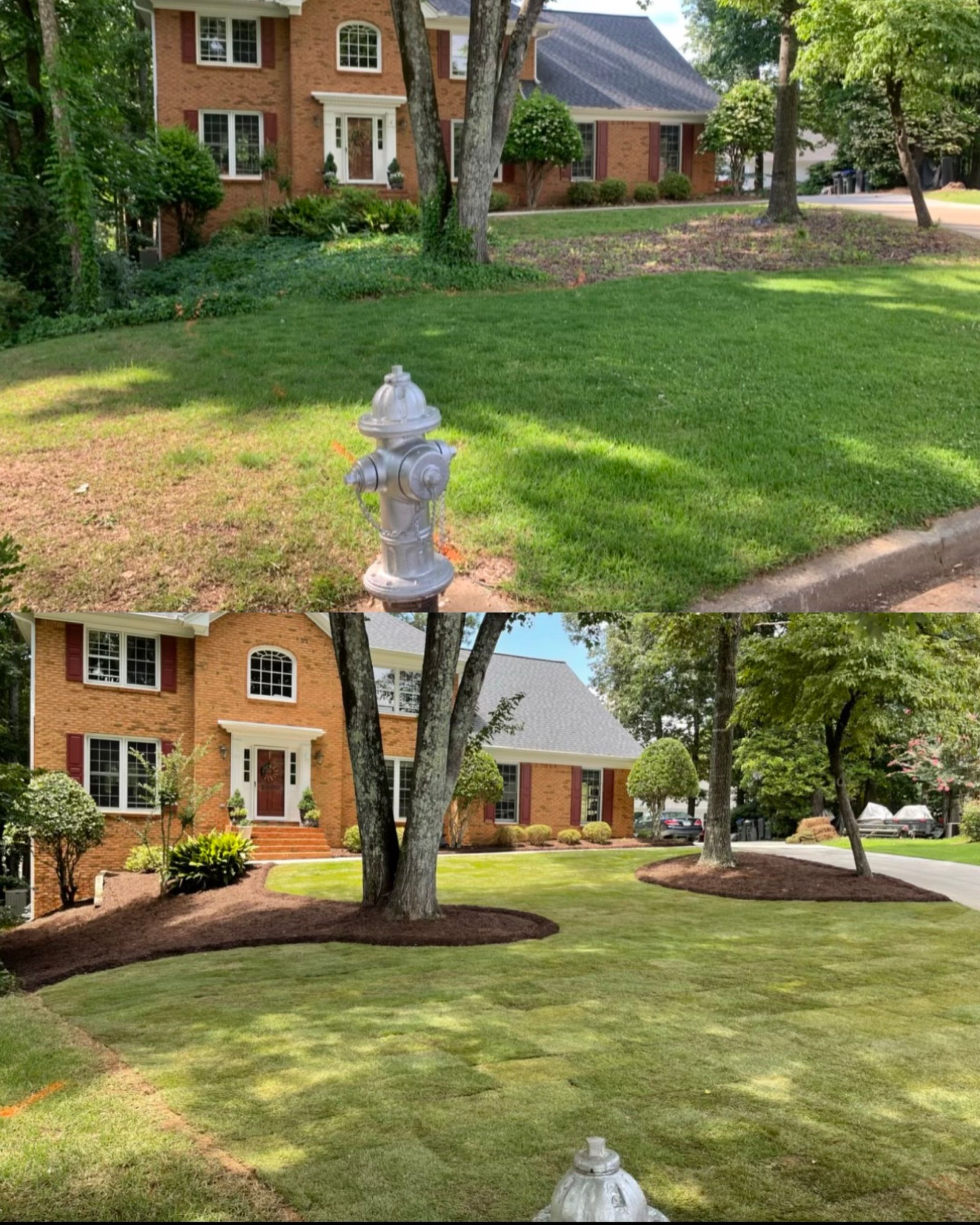 A fire hydrant is in the middle of a lush green lawn in front of a brick house.