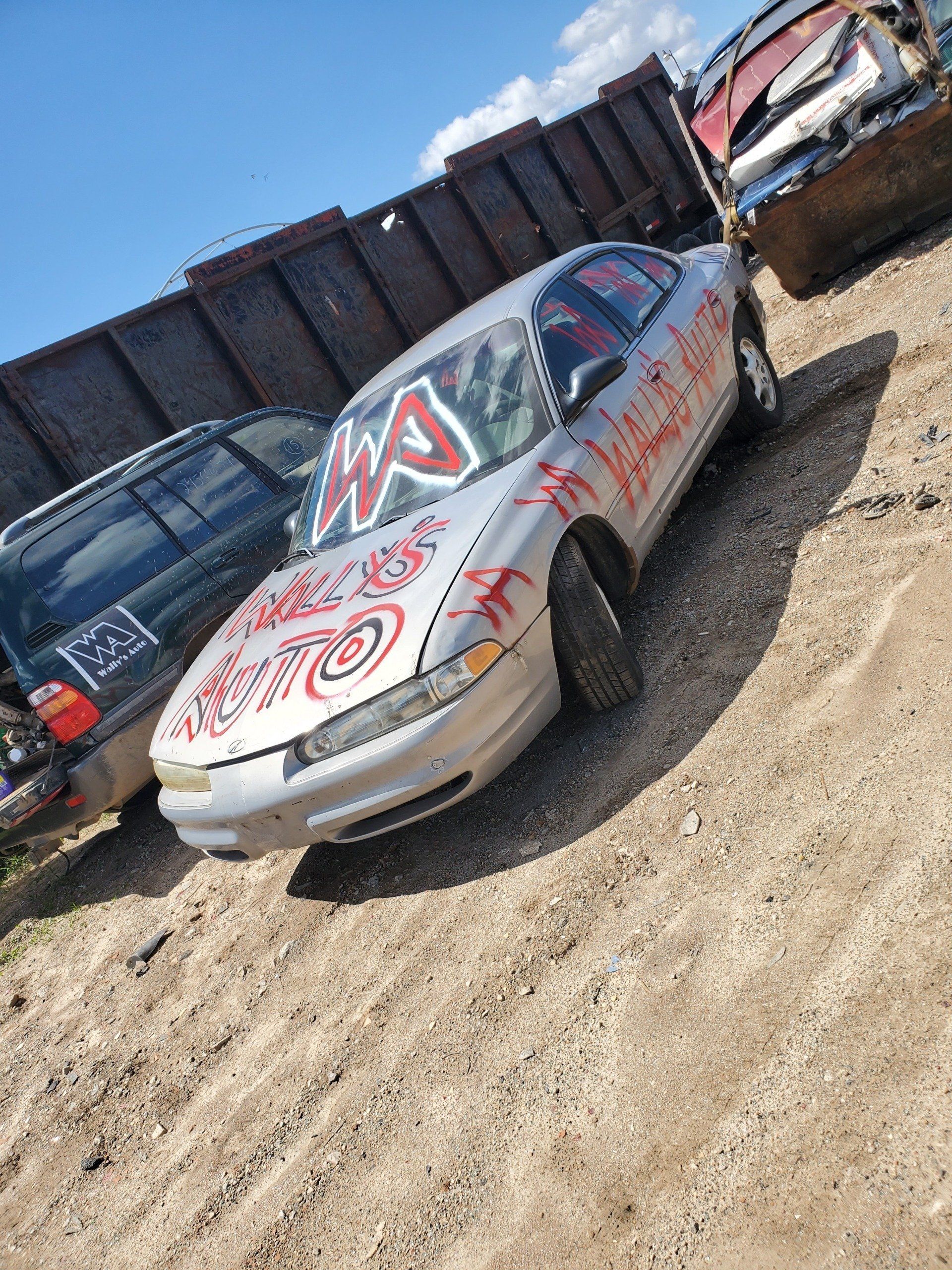 Vandalized white car