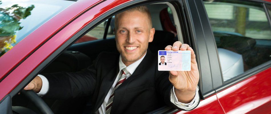 Man showing his Driver's License