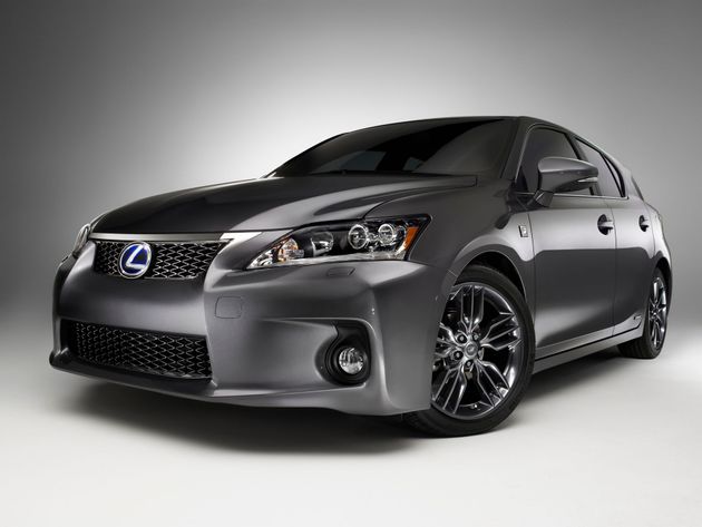 A metallic gray Lexus CT 200h hatchback parked against a neutral, light-gray studio background.