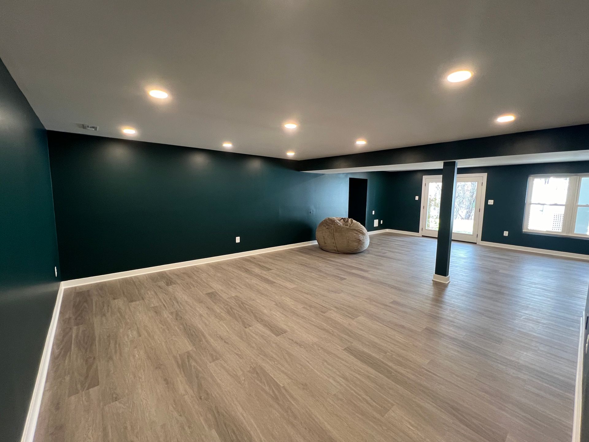 A laundry room with a washer and dryer in a closet.