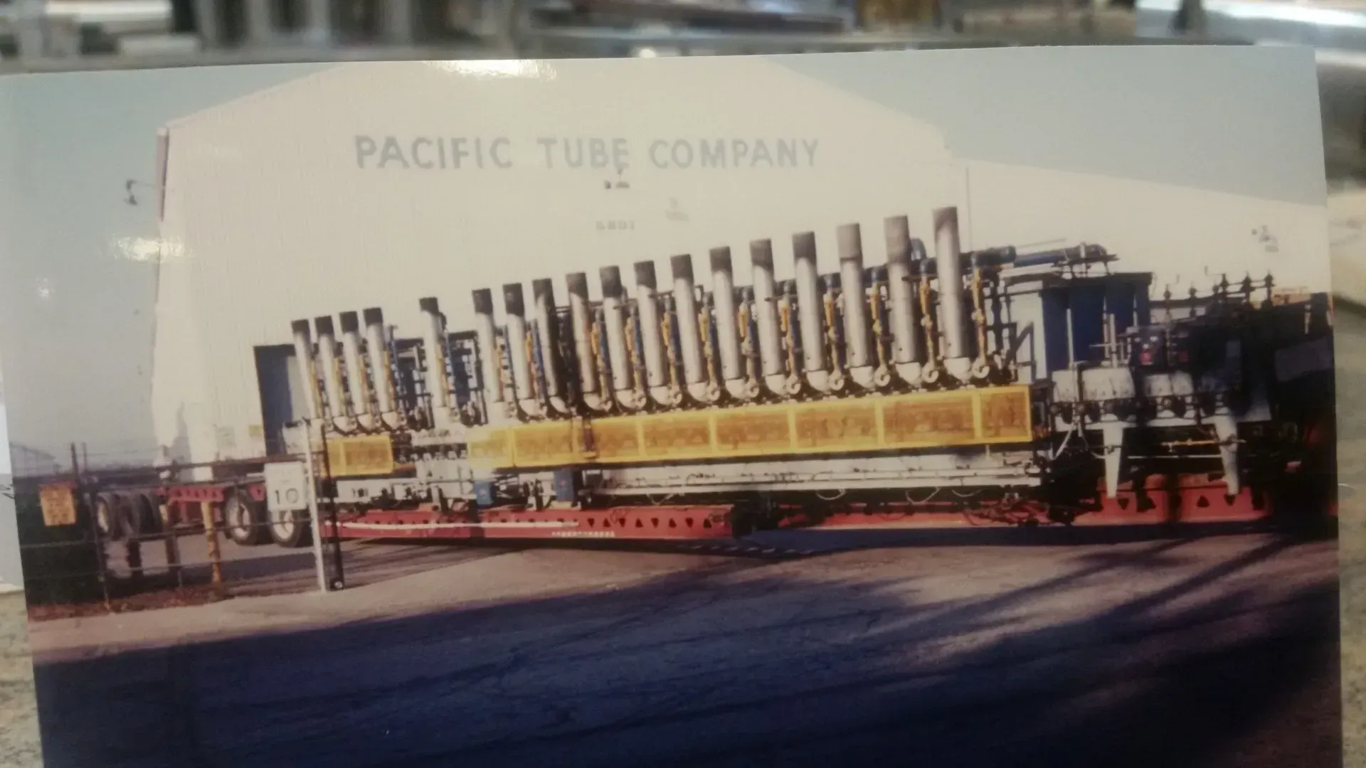 A black and white photo of a pacific tube company
