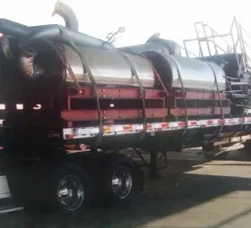 A large semi truck is parked on the side of the road.