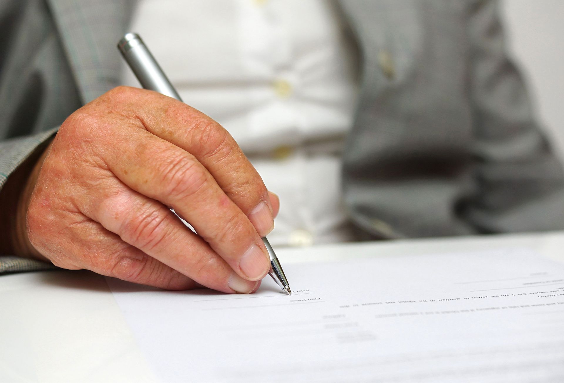Elderly signing