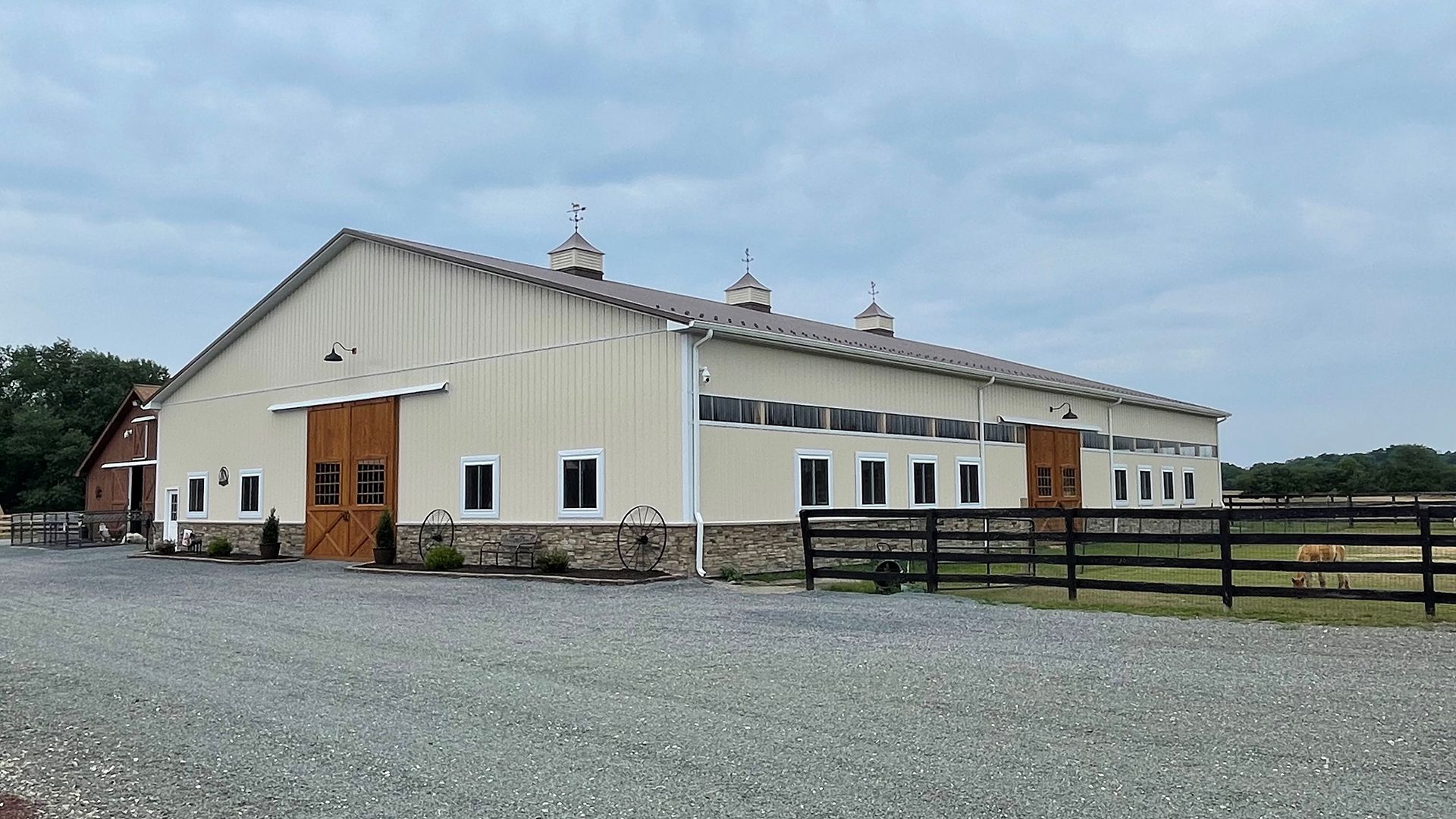 Side view of a horse barn