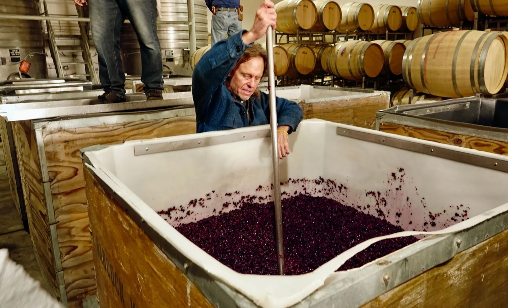 A man is making wine