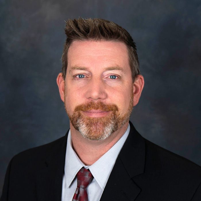 Photo of {{Team Member Name}}