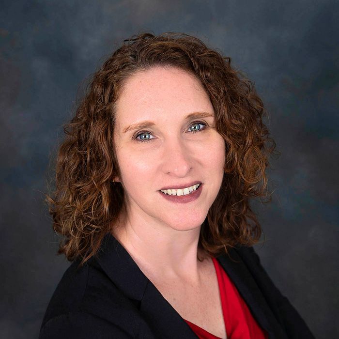 Photo of {{Team Member Name}}