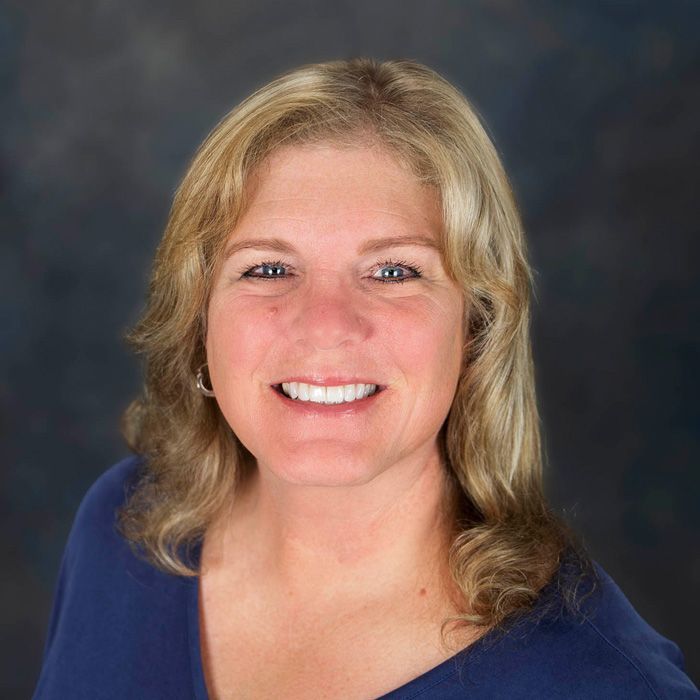 Photo of {{Team Member Name}}