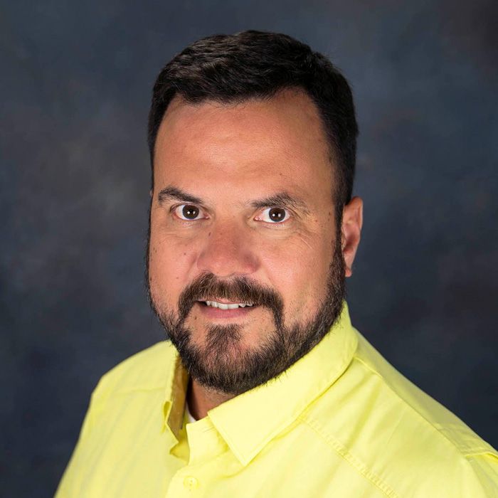 Photo of {{Team Member Name}}