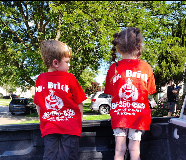 Two children in red
