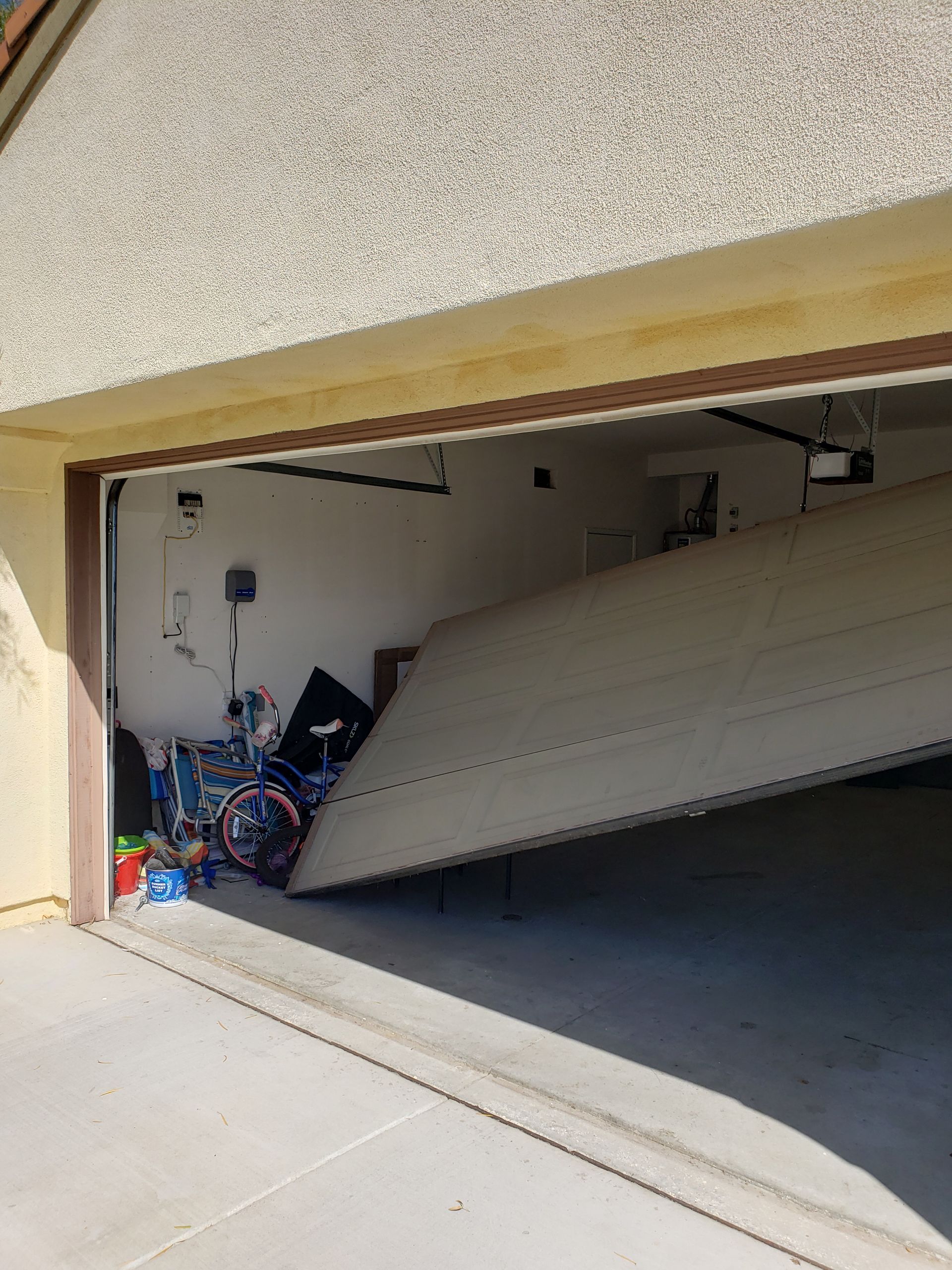A garage door that has fallen off