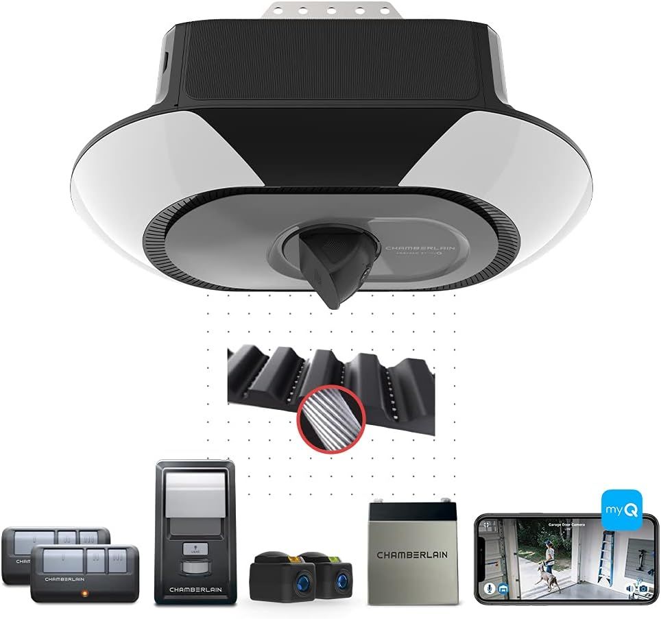 A picture of a garage door opener with remotes and cameras.