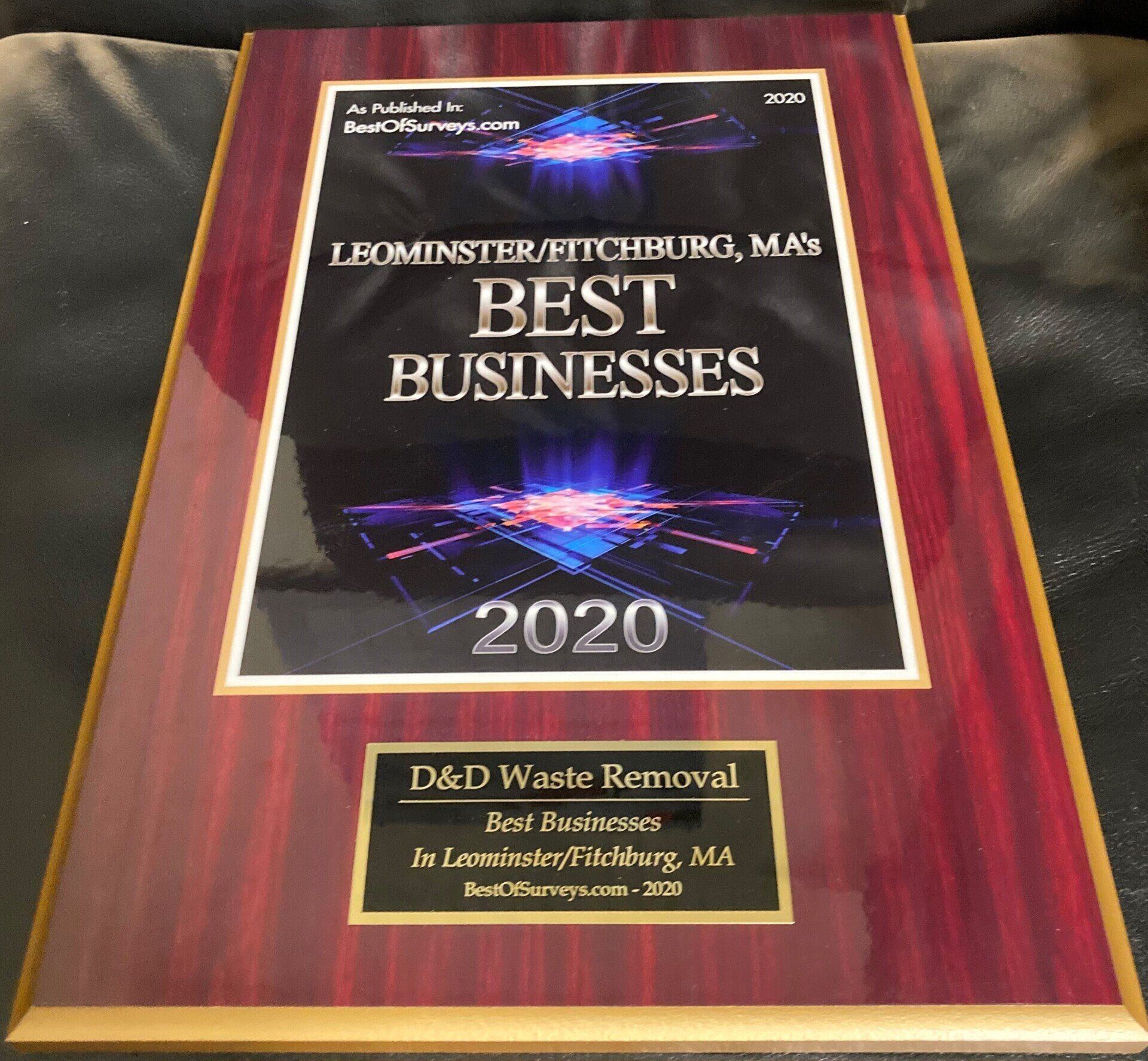 A plaque that says best businesses on it