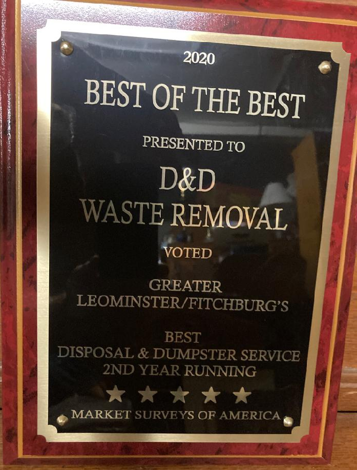 A plaque that says best of the best presented to d & d waste removal