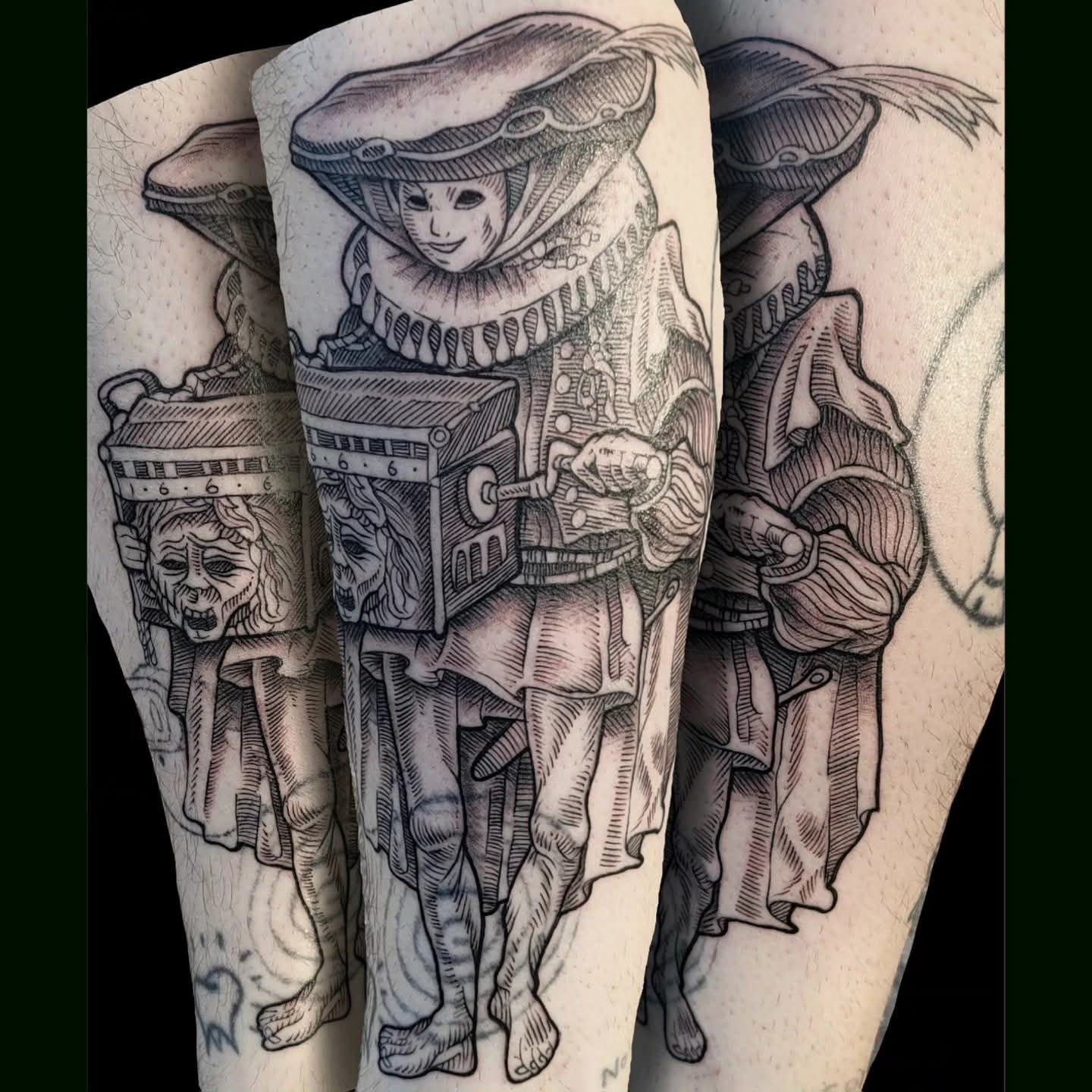 Detailed black and white tattoo of a medieval-style figure holding a box with a crank, set on an arm.
