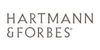 Hartmann & Forbes logo in gray text on a white background