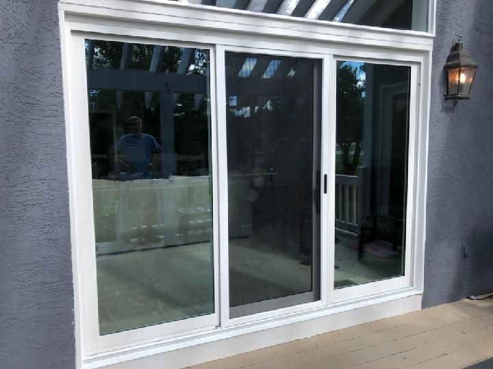 A sliding glass door and deck.