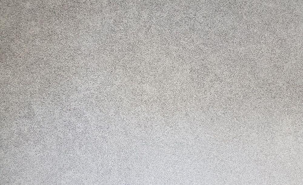 Gray, textured surface.