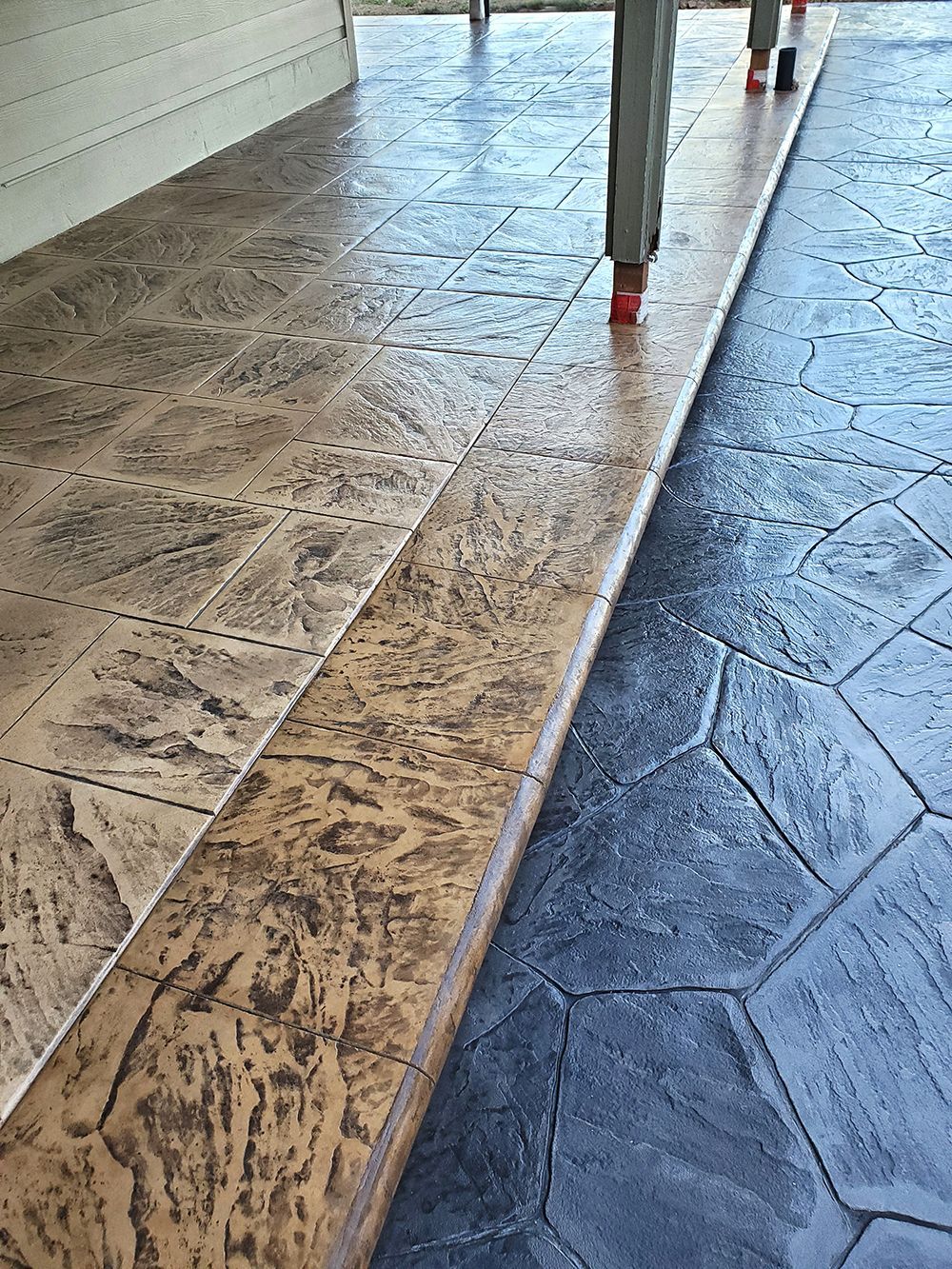 Stamped concrete patio with various patterns and colors.