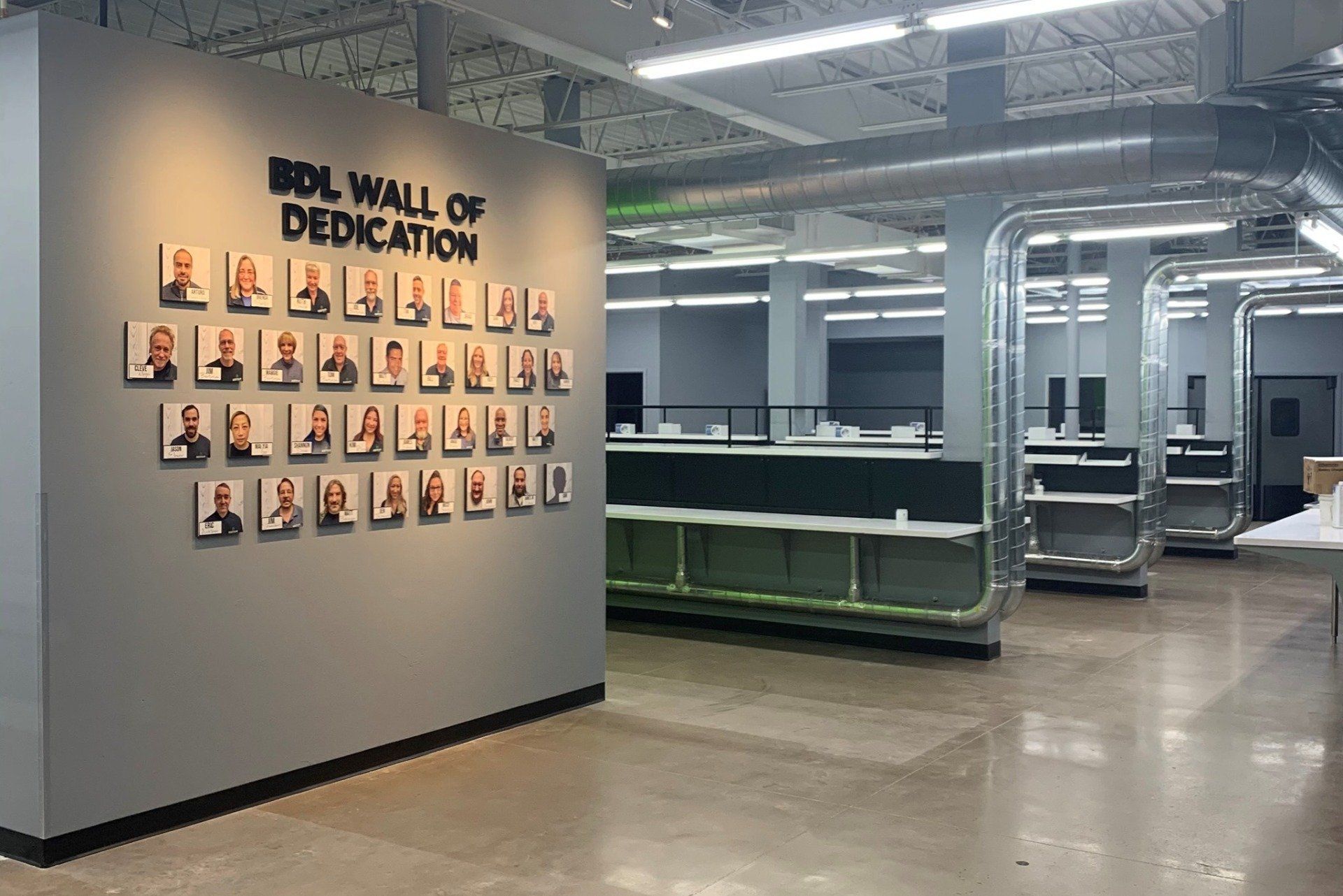 There is a wall of dedication in the middle of the room.