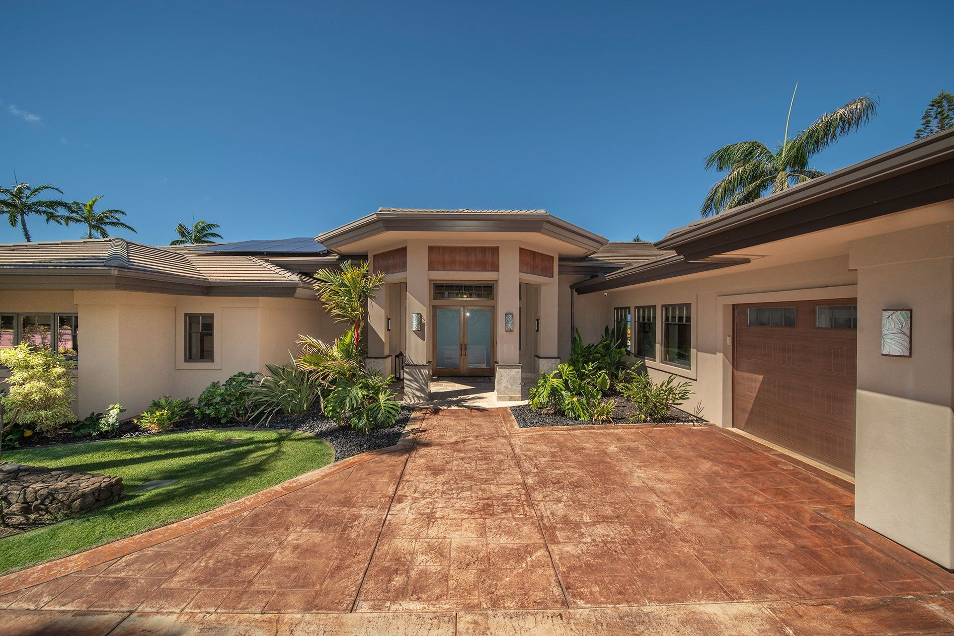 A large house with a driveway leading to it