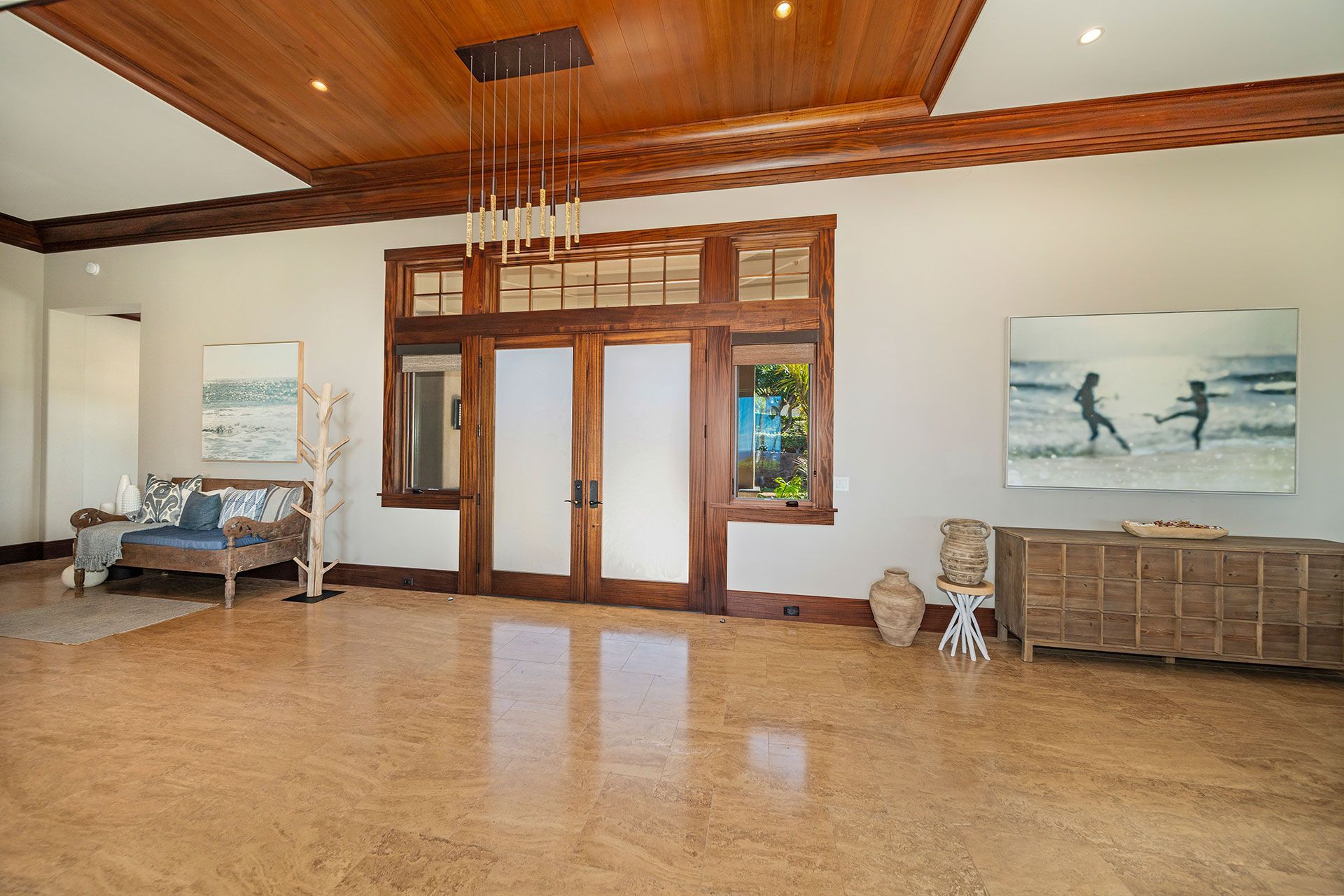 A living room with a couch and a painting on the wall
