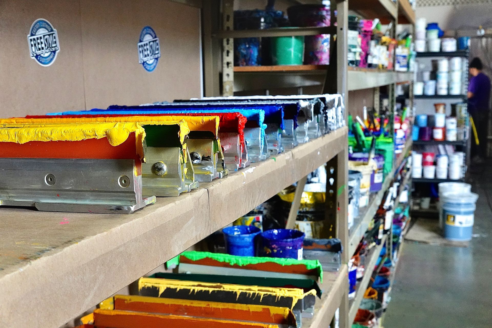 A warehouse filled with lots of different colored paints