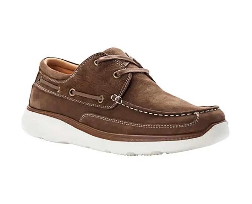 Brown suede boat shoe with white sole and laces on a white background