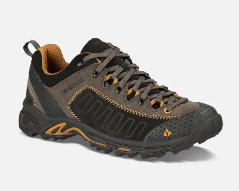 Brown and black hiking shoe with orange accents on a white background