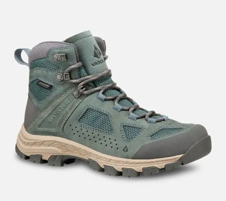 Green-gray hiking boot with tan sole and black toe cap, side view on white background