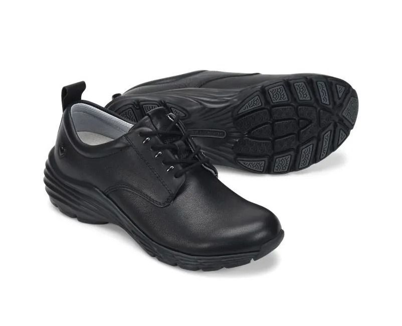 Black lace-up work shoes shown from side and sole on a white background