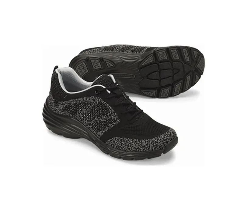 Black athletic sneakers shown from the side and sole on a white background