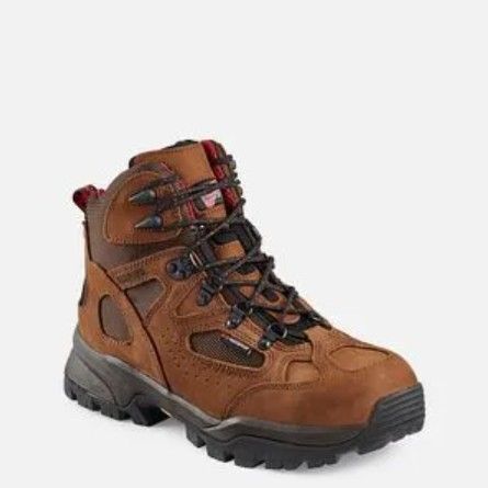 Brown and black hiking boot with rugged sole and lace-up design