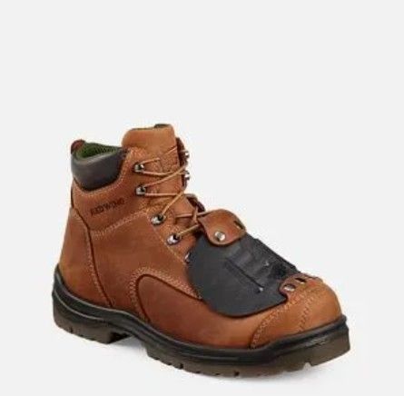 Brown leather work boot with black padded tongue and black sole, shown on a white background