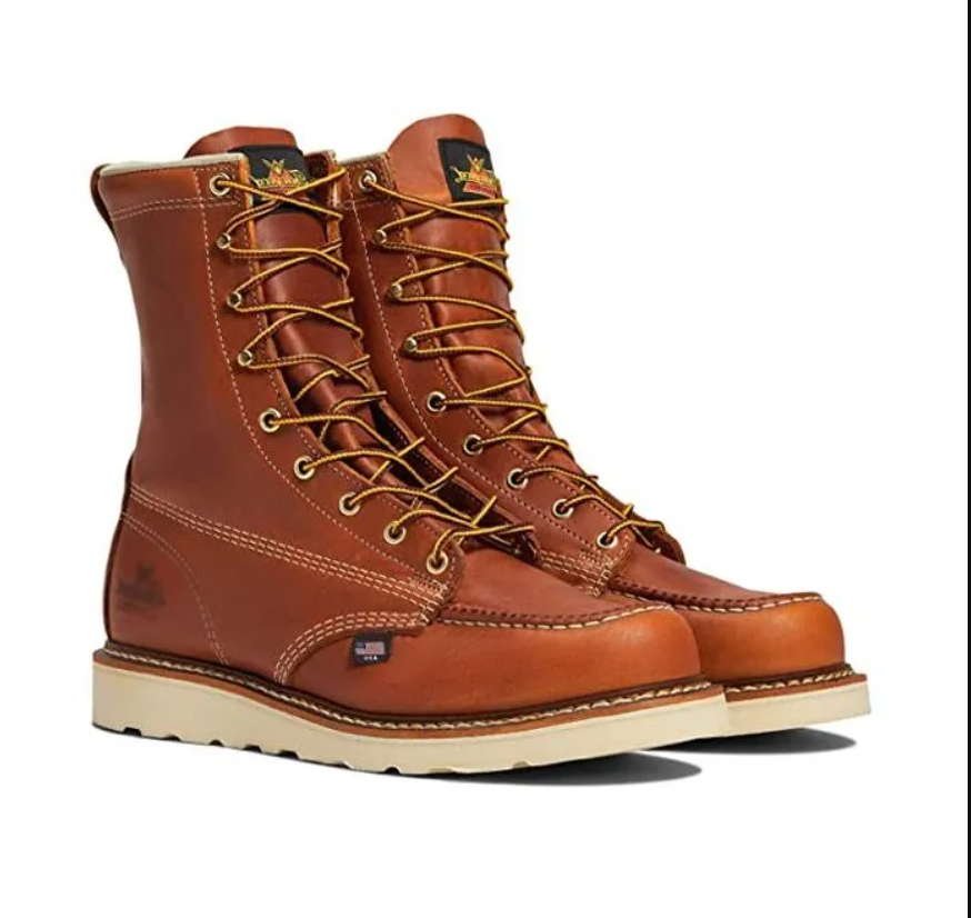Brown leather lace-up work boots with tan soles, shown on a white background